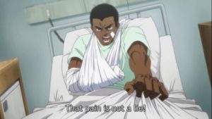 image of enraged black man in hospital bed.